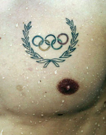 A tattoo on the chest of a swimmer