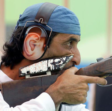 United Arab Emirates Shaikh Ahmed Almaktoum shoots during a Men's Double Trap training session at Clay Target Field