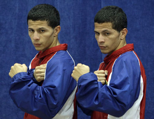Puerto Rico's boxers Mcwilliams Acevedo Arroyo, left, and his twin brother McJoe Acevedo Arroyo