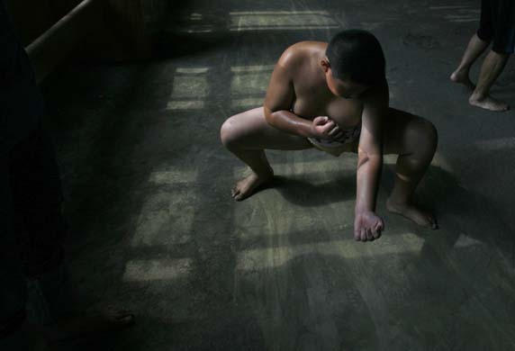 boy trains at the Wanpaku sumo-wrestling