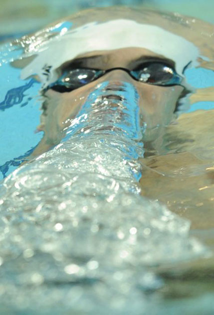 US swimmer Michael Phelps competes during the men's 400m individual medley swimming heat 