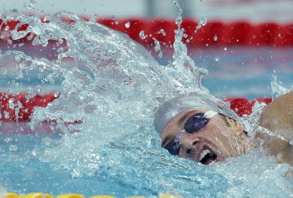 Italy's Massimiliano Rosolino swims in a men's 400-meter freestyle heat during the swimming competitions