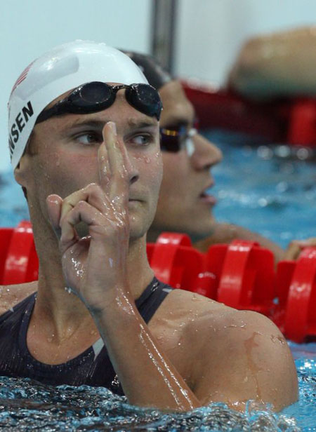 US swimmer Larsen Jensen celebrates after the men's 400m freestyle swimming heat