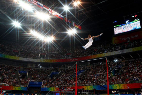 Louis Smith of Great Britain competes on the high bar during the artistic gymnastics event in Beijing 