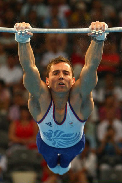 Daniel Keatings of Great Britain on the horizontal bar during the artistic gymnastics event held at the National Indoor Stadium in Beijing
