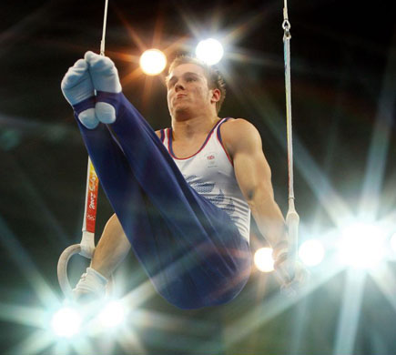 Daniel Keatings of Great Britain competes on the rings during the artistic gymnastics event held at the National Indoor Stadium in Beijing