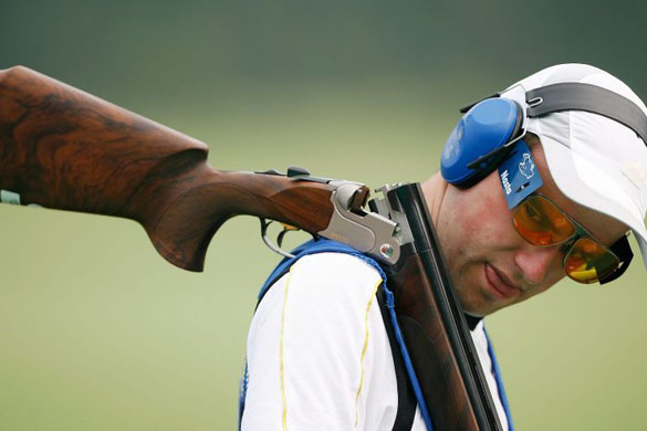 Stefan Ruettgeroth of Germany competes in the men's trap qualification shooting event held at the Beijing Shooting Range 