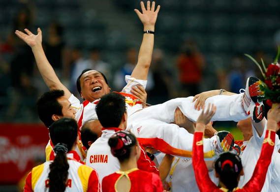 gym coach celebrates