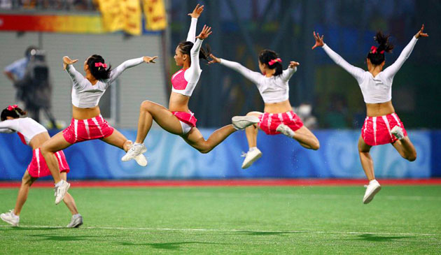 olympics: Dancers perform during a half time break in the men's hockey match