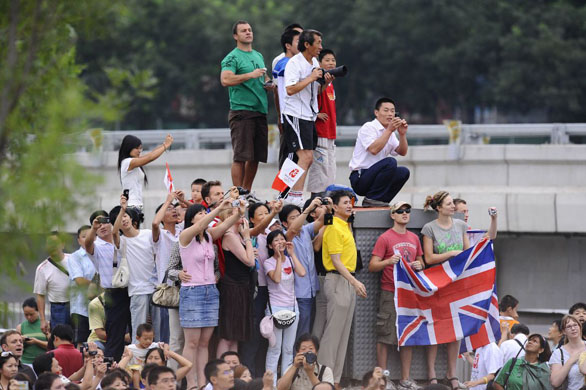 British fans mix with Chinese to get a view of the race