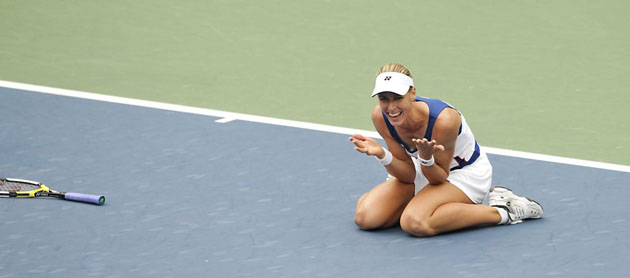 Elena Dementieva from Russia celebrates after winning the Olympic gold in the women's singles tennis match against Dinara Safina