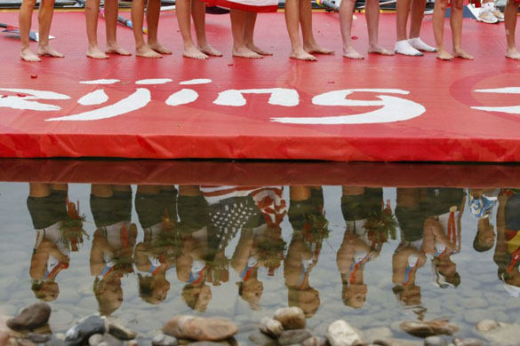 Members of the U.S rowing team pose after winning gold 