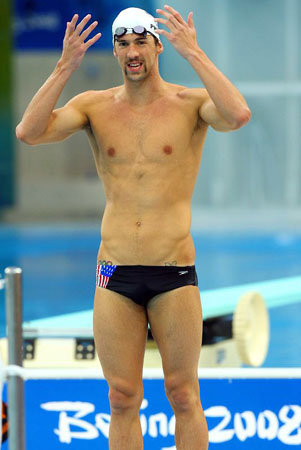 Michael Phelps has two tattoos peeking out of his trunks - one of 