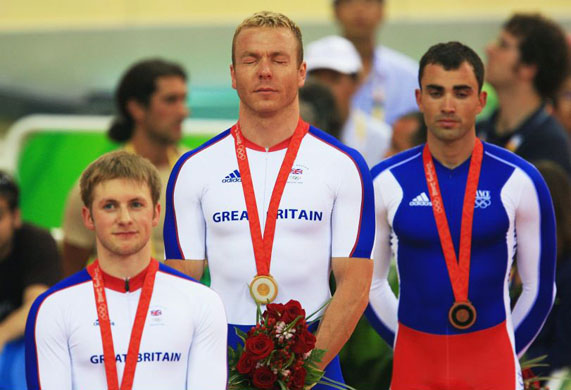 Gold medalist Chris Hoy fights back the tears with Silver medalist Jason Kenny after the Men's Sprint Final  