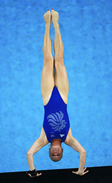 Stacie Powell competes in the women's 10 metres platform diving preliminary round