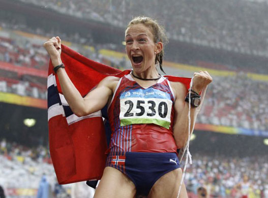Norway's Kjersti Tysse Platzer celebrates winning the silver medal in the women's 20-kilometer race