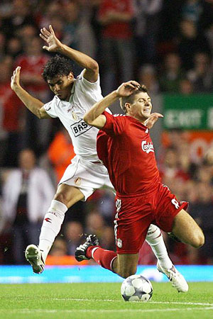 Steven Gerrard is tackled