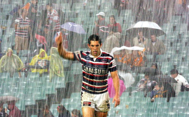 Braith Anasta of the Roosters signals to his team mates while kicking off after a Tigers try during the round 12 NRL match between the Sydney Roosters and the Wests Tigers in Sydney