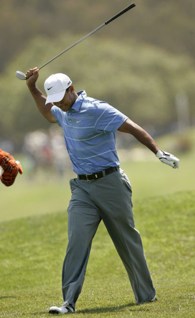 Tiger Woods reacts to his second shot on the 12th hope of US Open in San Diego