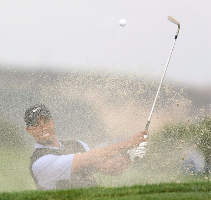 Tiger Woods of the US hits from a bunker at US Open 