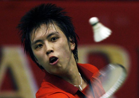  Japan's Kenichi Tago hits a return in Jakarta 