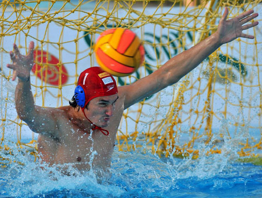 Goalkeeper Robert Dinu of Romania saves a penalty in Szolnok