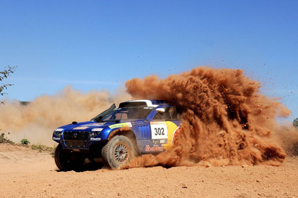 South Africa's driver Giniel de Villiers races his Volkswagen near Lizarda