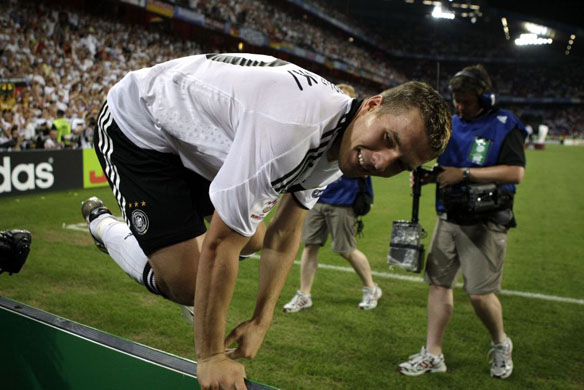 Germany's Lukas Podolski celebrates his side's 3-2 win in Basel 