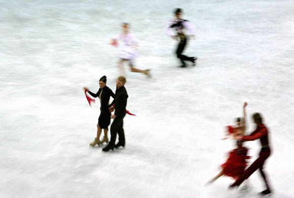 Isabelle Delobel and Olivier Schoenfelder of France practice their original programme