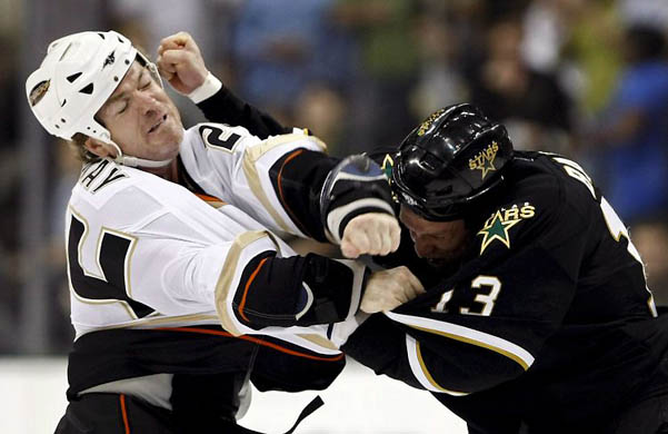 Anaheim Ducks player Brad May fights against Dallas Stars player Krystofer Barch