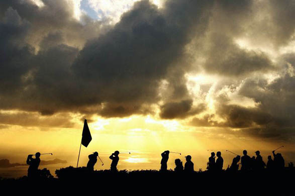 Golfers warm up on the practice range during Round One of the Madeira Islands Open BPI 2008