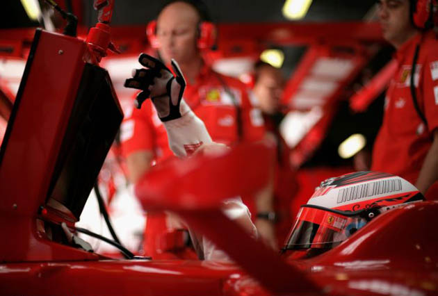 Kimi Raikkonen of Finland and Ferrari is seen in his garage during practice for the Spanish Formula One Grand Prix