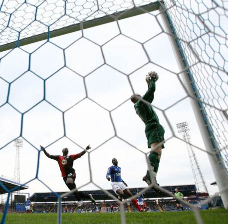 Jamie Ashdown of Portsmouth catches the ball