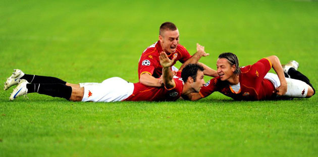 Roma players celebrate