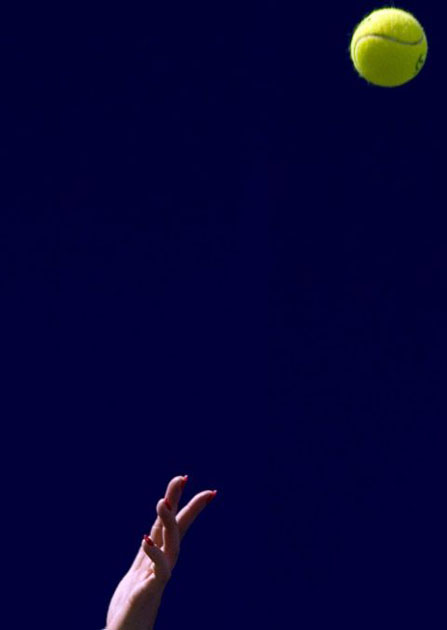 Zheng Jie serves against Ana Ivanovic during their quarter final match at the China Open