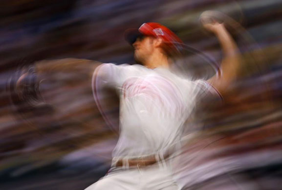 pitcher prepares to throw