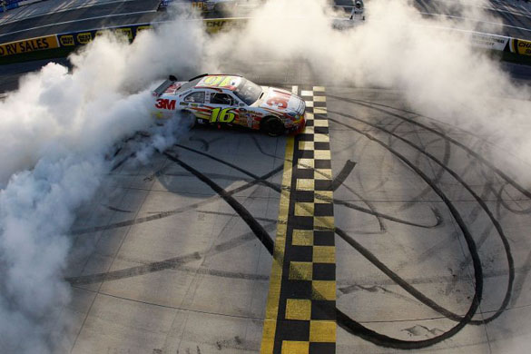 Greg Biffle celebrates after winning the NASCAR Sprint Cup Series   