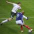 World Cup Play-Offs: Nicolas Anelka drags the ball back to evade the challenge of Richard Dunne