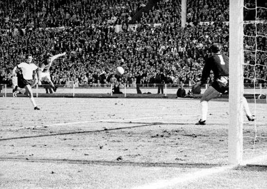 Geoff Hurst crores the final goal against West Germany in the 1966 World Cup final
