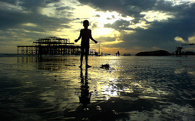 My son and sunset, Brighton, East Sussex, England