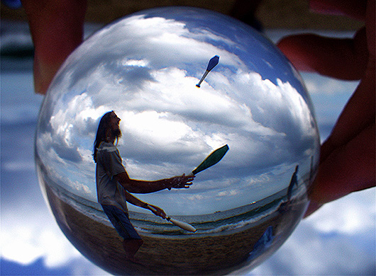 Juggling on the beach, Swanage, Dorset, England