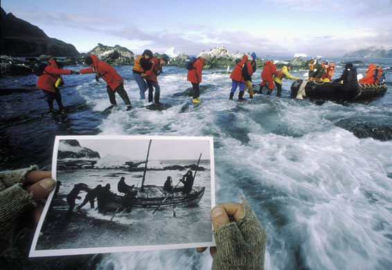 Tourists explore the beach in Antarctica from which the explorer Ernest Shackleton left Elephant Island for South Georgia Island