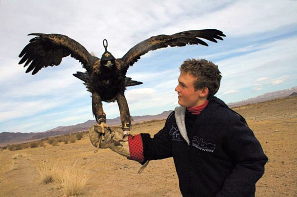 Dexter Pletts with an eagle in Mongolia
