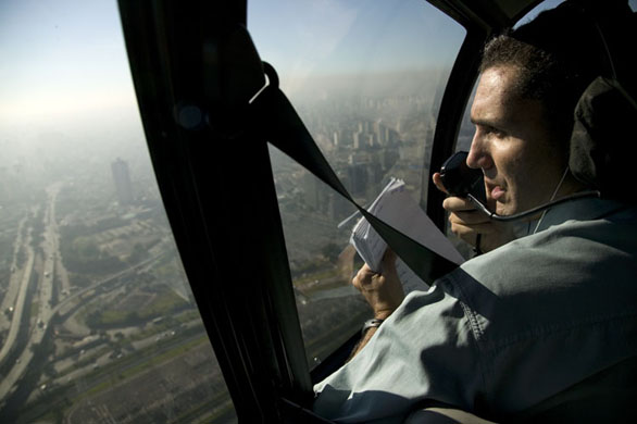 Radio man reports from the air in Sao Paulo 