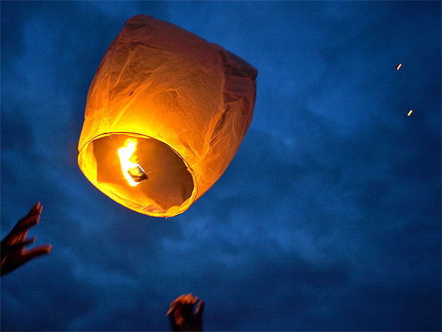 wedding reception releasing probably illegally Chinese Lanterns into