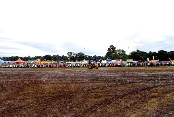 After torrential overnight rain, organisers held back festival goers and cancelled opening acts on day two of the V Festival at Weston Park  in Telford