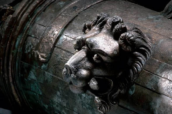 A lion's head adorns the side of a bronze cannon, salvaged from Mary Rose