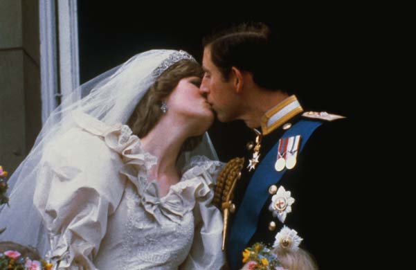 Prince Charles kisses Princess Diana