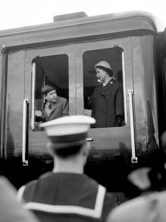 Queen Elizabeth and Prince Charles on a train