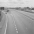 M1 motorway: 1960: A car turns off the empty M1 motorway to a Fortes Service Station